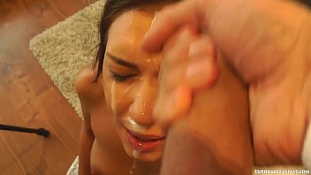 A Russian Beauty Gets Her Mouth Stretched By A Massive Cock Before Being Painted With A Monster Load.