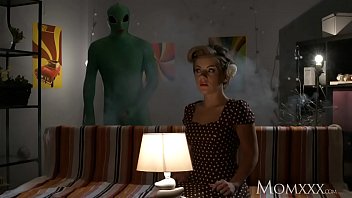 Lonely Housewife’s Halloween Night Takes An Otherworldly Turn When An Alien Visitor Gives Her An Intimate Examination She’ll Never Forget.