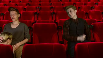 A Steamy Cinema Threesome: Two Tops Taking Turns With One Eager Bottom.