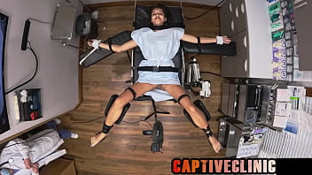 Aria Nicole, A Sweet Young Virgin, Is Snatched Up By The Sinister Good Samaritan Health Labs And Delivered To Doctor Tampa’s Bondage Clinic, Where She’ll Be The Star Of His Most Intimate And Twisted Medical Trials.